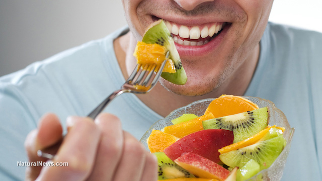 Happy-Man-Eating-Bowl-Of-Fruits