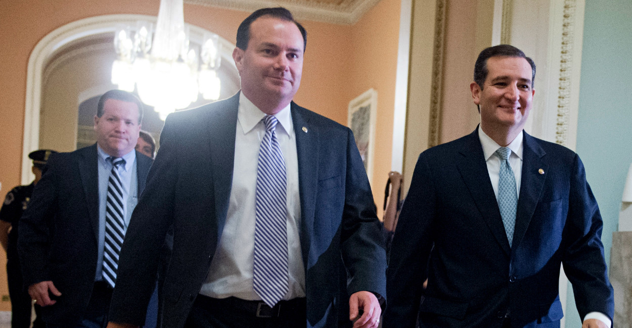 UNITED STATES - OCTOBER 16: Sens. Mike Lee, R-Utah, left, and Ted Cruz, R-Texas, make their way to the Senate floor in the Capitol  where the Senate voted to end the government shutdown and raise the nation's debt ceiling. (Photo By Tom Williams/CQ Roll Call)