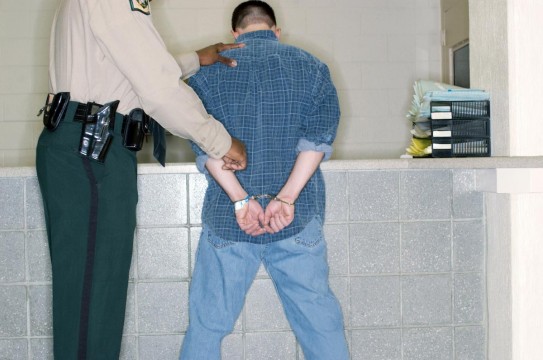 Police-Arrest-Man-Criminal-Handcuffs